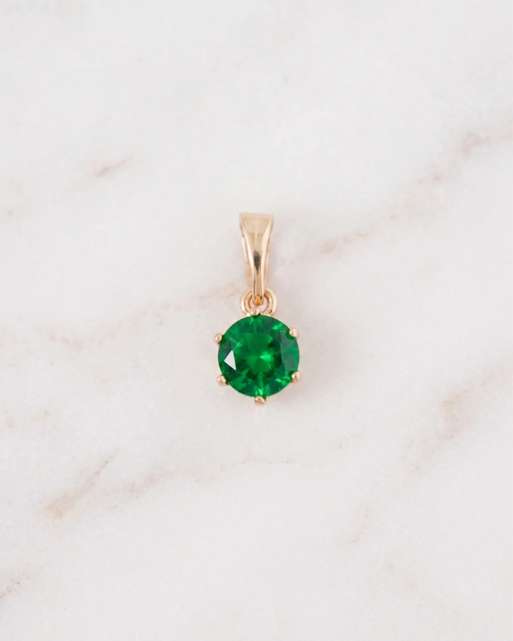 DIJE PUNTO DE LUZ ESMERALDA GOLD 0.8CM